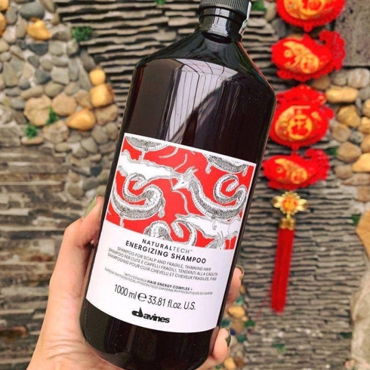 Dầu gội Davines Energizing Shampoo, ngăn rụng và kích thích mọc tóc dành cho mái tóc mỏng và dễ gãy rụng.